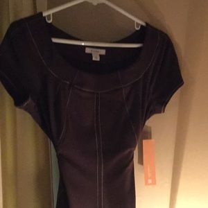 New with tags. Size 8 body hugging stretchy dress